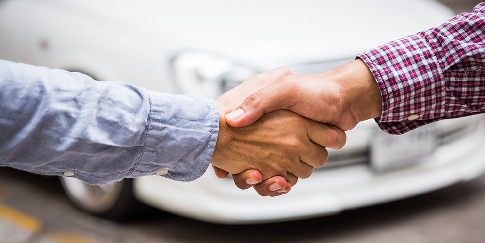 Shaking hands on quality car parts